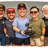 Caricature group with quirky trophy